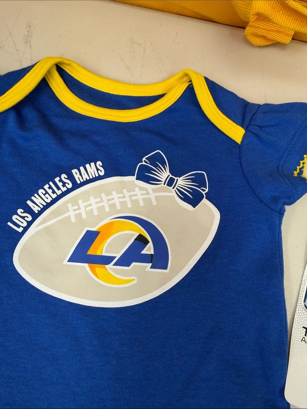 Los Angeles Rams Infant One-Piece Bodysuit in Royal Blue and Yellow 6-9 months